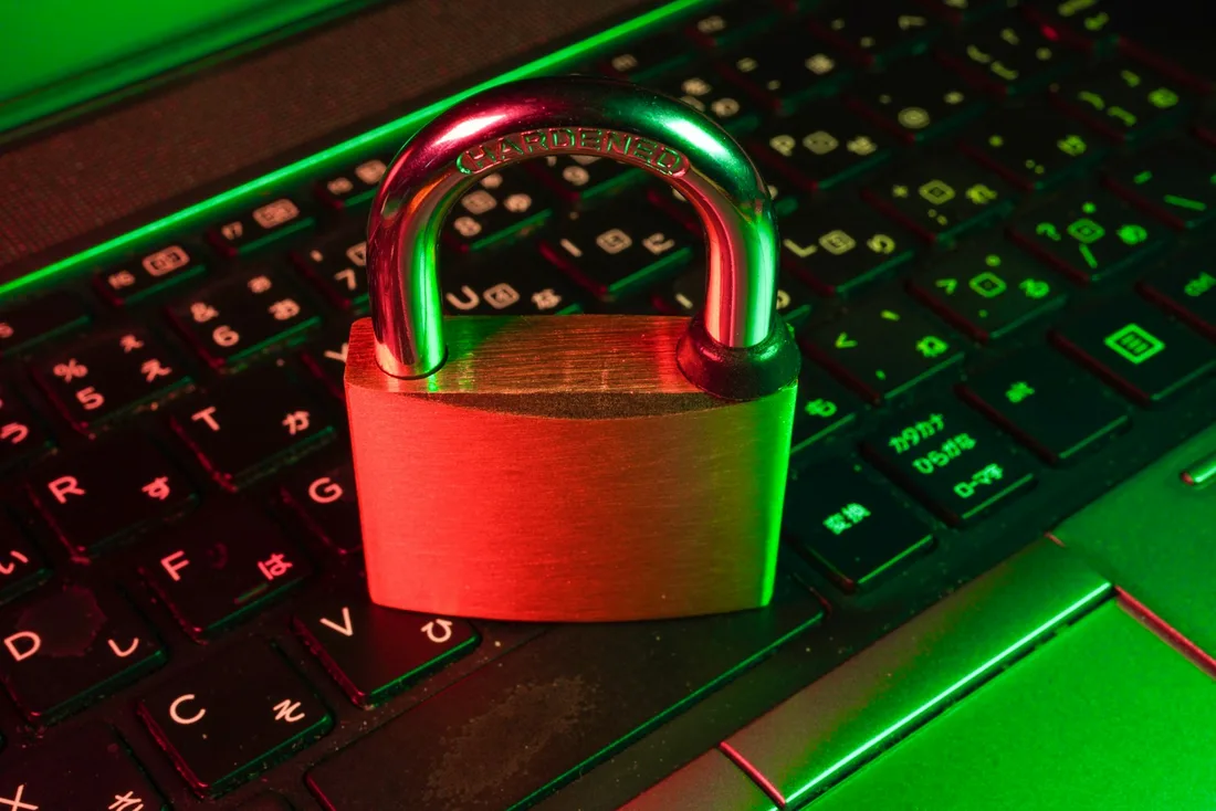 Red padlock on a black keyboard — visual shorthand for web security